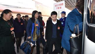 NPC deputies from Heilongjiang arrive in Beijing