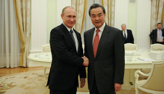 Russian president meets with visiting Chinese FM in Moscow