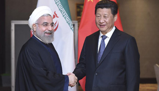 Xi Jinping meets Iran's President Rouhani in Jakarta