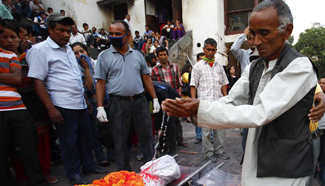 People mourn victims of helicopter crash in Kathmandu