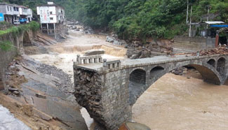 10 killed by rain-triggered floods and landslides in SW China