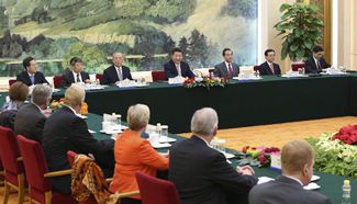 Xi meets U.S. delegates attending 7th China-U.S. business leaders' and former senior officials' dialogue