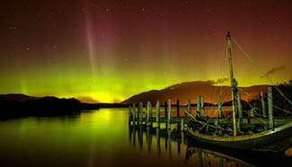 Aurora lights up night sky over Lake Derwentwater