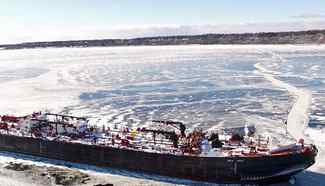 Cargo container ship trapped in frozen Lake Michigan