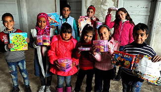 Displaced kids receive education by volunteer teachers in Syria