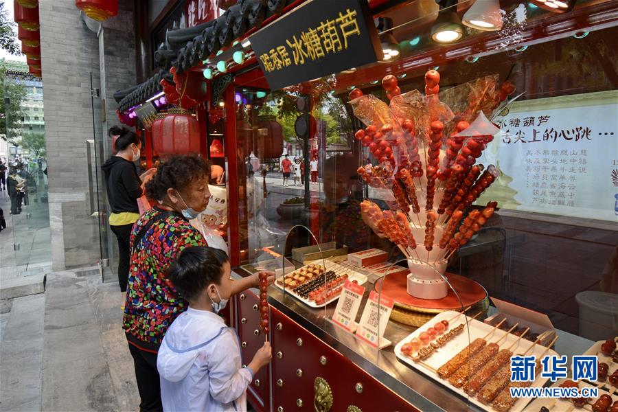 （经济）（5）北京：老商业街上热闹的消费月