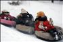 12月9日，游客在长春净月潭滑雪场享受雪地运动的乐趣。新华社记者林宏摄