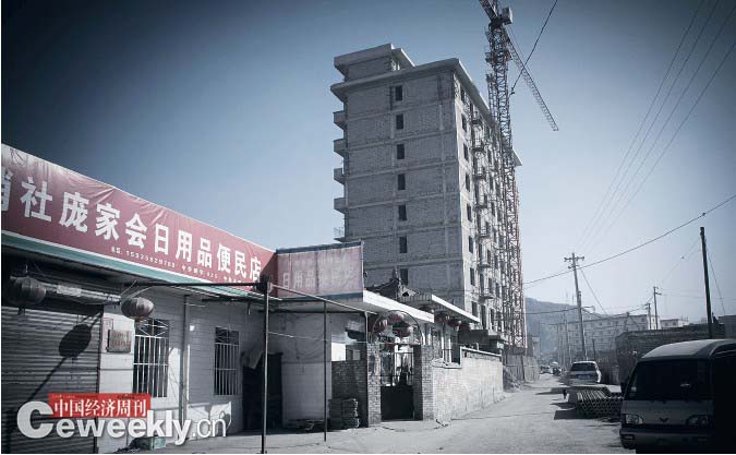 快速的城镇化,让“农村”庞家会突然进入居委会时代。(本刊记者 韩文摄)