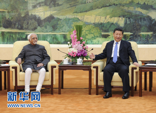 6月30日，国家主席习近平在北京人民大会堂会见印度副总统安萨里。新华社记者 张铎 摄