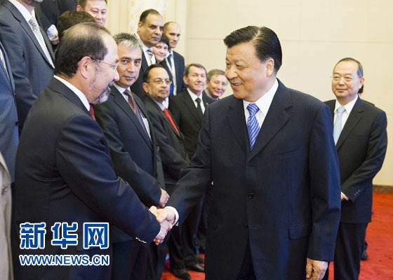  7月3日，中共中央政治局常委、中央书记处书记刘云山在北京人民大会堂集体会见丝绸之路经济带媒体合作论坛外国媒体代表。 新华社记者 黄敬文摄