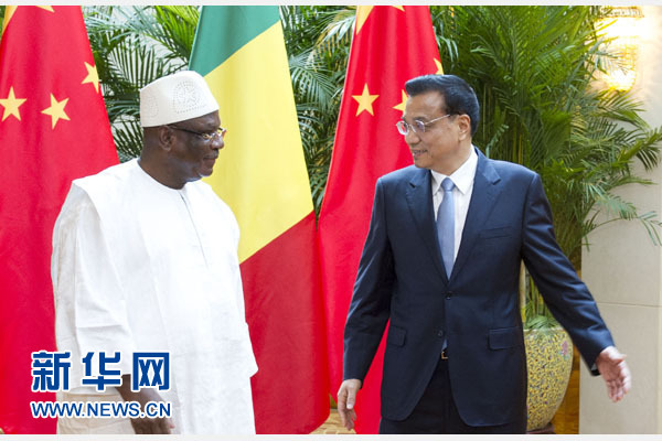 9月10日，中国国务院总理李克强在天津会见来华出席2014年夏季达沃斯论坛年会的马里总统凯塔。新华社记者王晔摄
