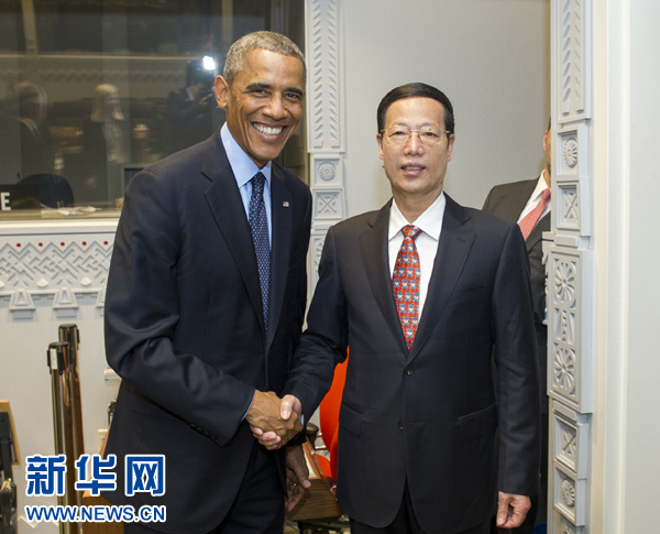 9月23日，国家主席习近平特使、国务院副总理张高丽在纽约会见出席联合国气候峰会的美国总统奥巴马。 新华社记者王晔摄