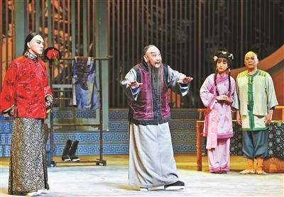 媒体揭秘2015年新年戏曲晚会：七常委同看反腐戏