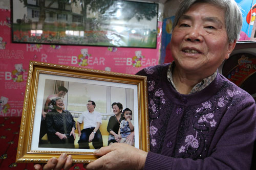 总理两次看望的李忠义大娘准备告别棚户区