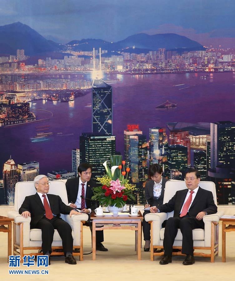 4月8日，中共中央政治局常委、全国人大常委会委员长张德江在北京人民大会堂会见越南共产党中央总书记阮富仲。 新华社记者 庞兴雷 摄