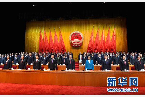 10月1日，庆祝中华人民共和国成立66周年暨新疆维吾尔自治区成立60周年大会在新疆人民会堂隆重举行。 新华社记者 饶爱民 摄