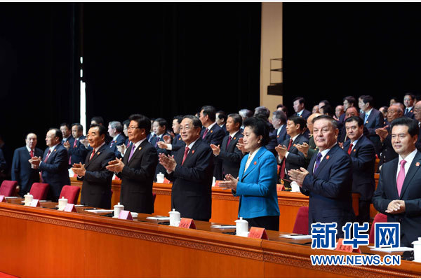 10月1日，庆祝中华人民共和国成立66周年暨新疆维吾尔自治区成立60周年大会在新疆人民会堂隆重举行。 新华社记者 饶爱民 摄 