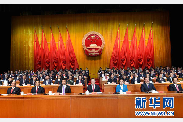 10月1日,庆祝中华人民共和国成立66周年暨新疆维吾尔自治区成立60周年大会在新疆人民会堂隆重举行。 新华社记者 饶爱民 摄 10月1日,庆祝中华人民共和国成立66周年暨新疆维吾尔自治区成立60周年大会在新疆人民会堂隆重举行。 新华社记者 饶爱民 摄