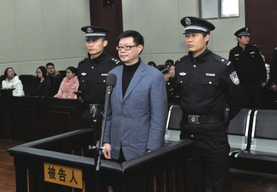 周文斌在法庭上。网络截图