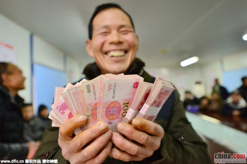 上海一工地用百万现金发工资 有人年薪超20万(组图)