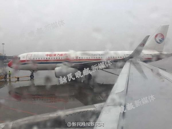 上海虹桥机场两架东航客机机翼发生碰擦