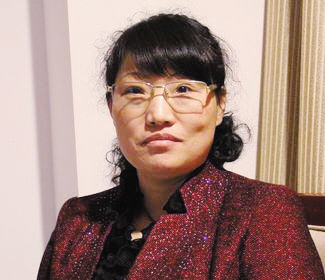 全国人大代表、黑龙江省齐齐哈尔市龙江县环卫处保洁队队长 王月清