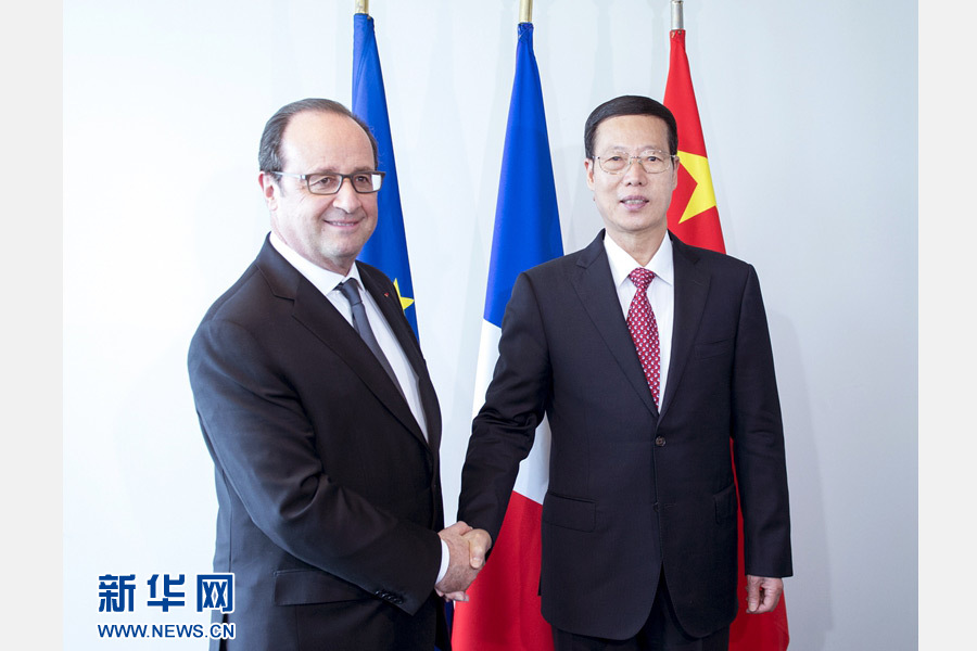 4月22日，国家主席习近平特使、国务院副总理张高丽在纽约会见出席《巴黎协定》高级别签署仪式的法国总统奥朗德。 新华社记者 王晔 摄