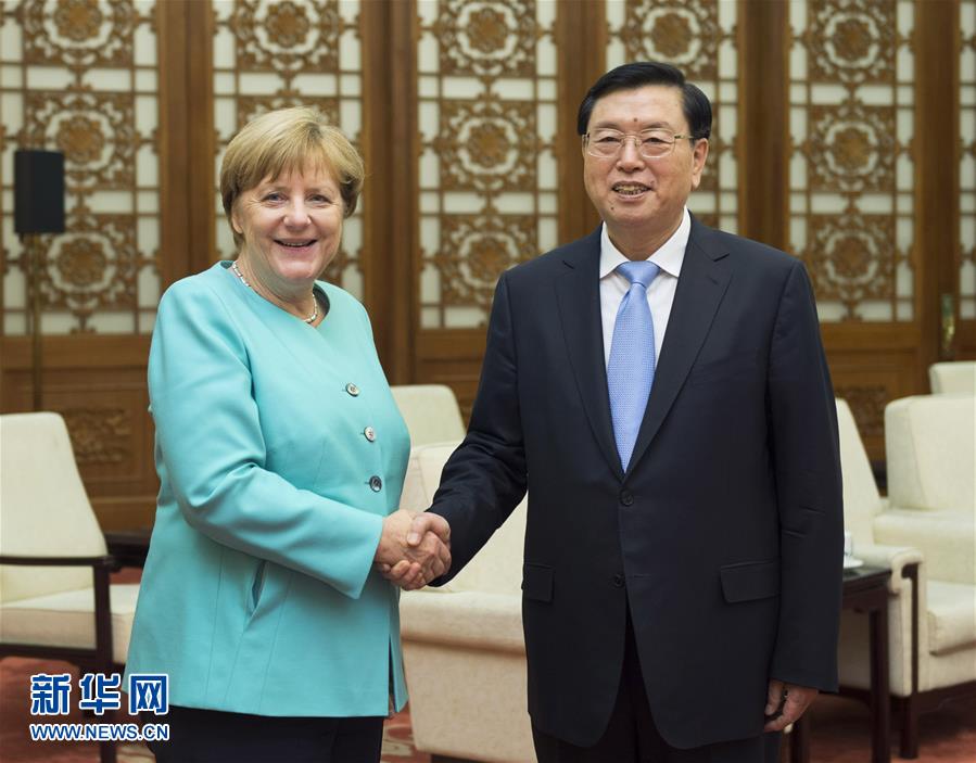 6月13日，全国人大常委会委员长张德江在北京人民大会堂会见德国总理默克尔。 新华社记者谢环驰摄