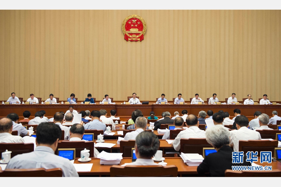 6月27日，十二届全国人大常委会第二十一次会议在北京人民大会堂举行第一次全体会议。张德江委员长主持会议。 新华社记者 谢环驰 摄