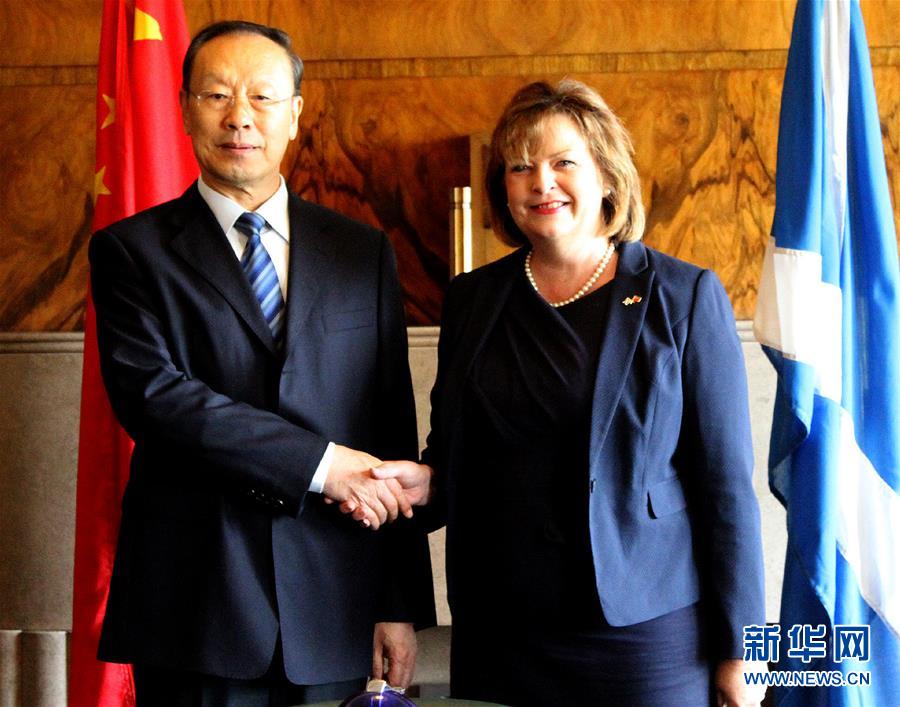 (XHDW)杜青林率中共代表团访问英国