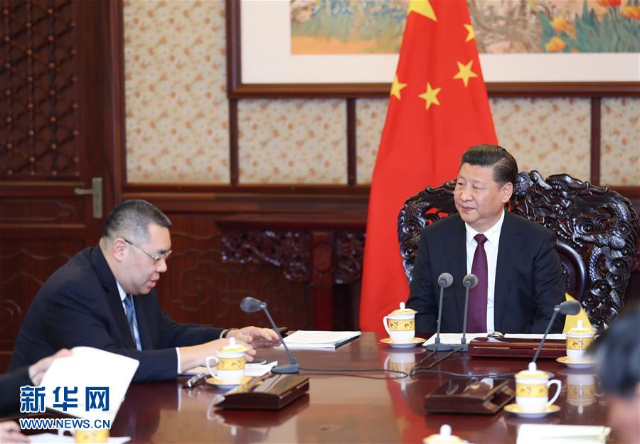 （时政）习近平会见来京述职的崔世安