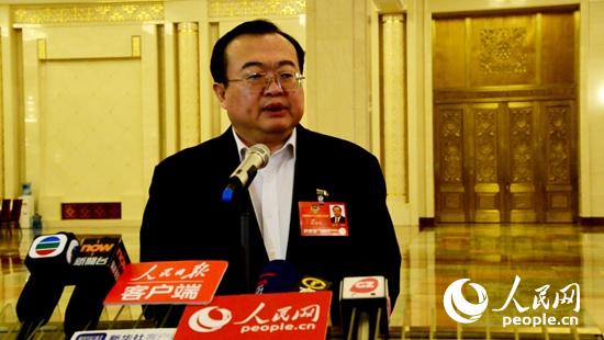 刘建超接受媒体采访。崔辰光摄