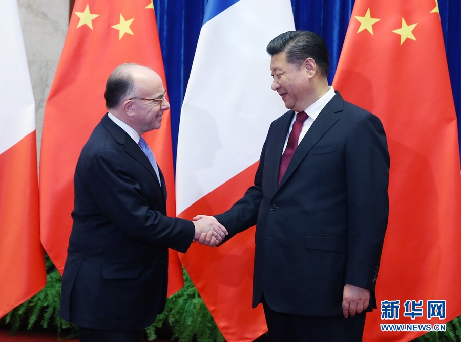 2月22日，国家主席习近平在北京人民大会堂会见法国总理卡泽纳夫。新华社记者 姚大伟 摄