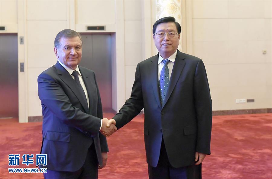 5月13日，全国人大常委会委员长张德江在北京人民大会堂会见乌兹别克斯坦总统米尔济约耶夫。新华社记者 张铎 摄
