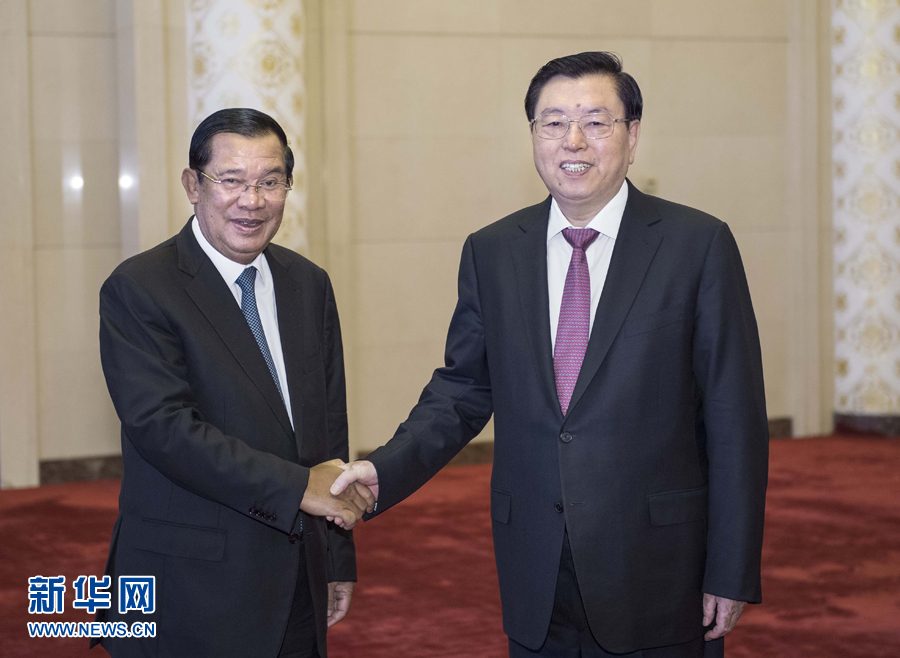 5月16日，全国人大常委会委员长张德江在北京人民大会堂会见柬埔寨首相洪森。 新华社记者 李涛 摄