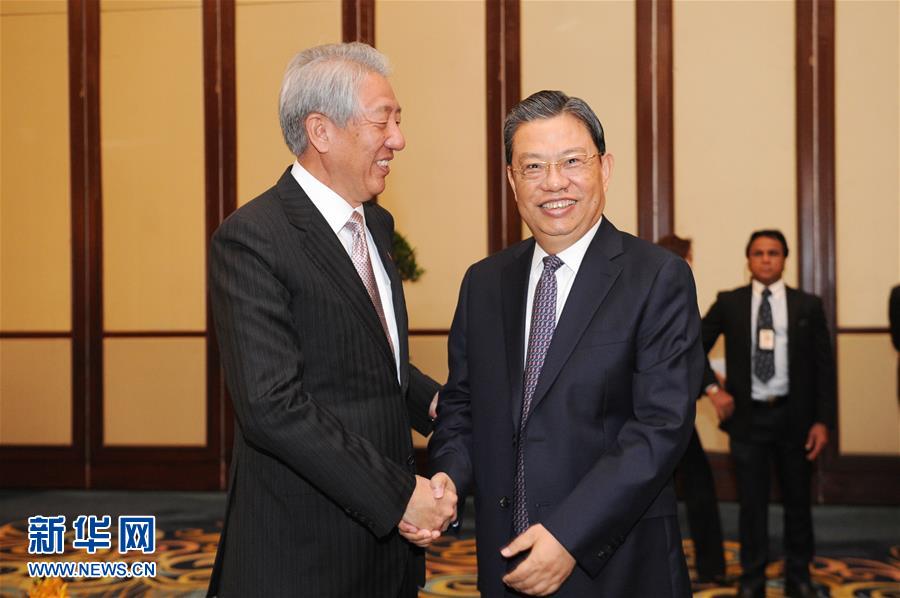 赵乐际会见新加坡副总理兼国家安全统筹部长张