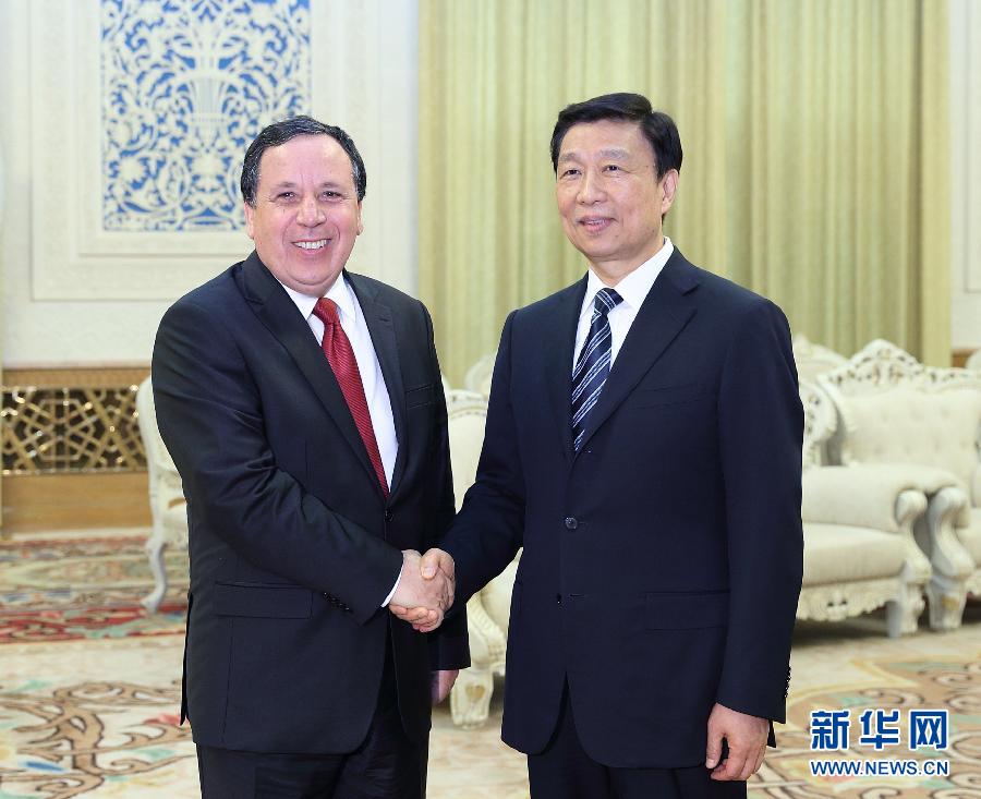7月20日，國家副主席李源潮在北京會見突尼西亞外長傑希納維。新華社記者王曄攝