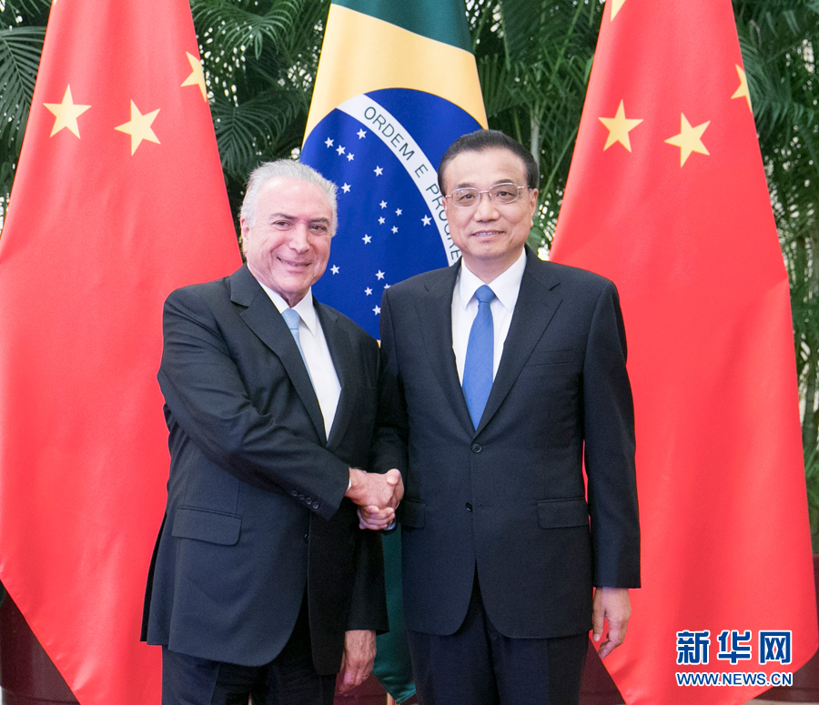 9月1日，国务院总理李克强在北京人民大会堂会见来华进行国事访问并出席金砖国家领导人厦门会晤和新兴市场国家与发展中国家对话会的巴西总统特梅尔。新华社记者 王晔 摄