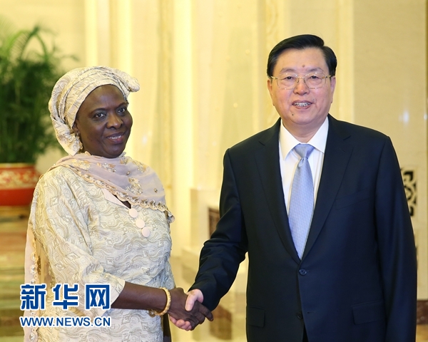 9月18日，全国人大常委会委员长张德江在北京人民大会堂与冈比亚国民议会议长登顿举行会谈。 新华社记者姚大伟摄
