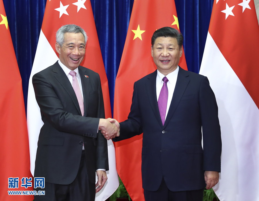 9月20日，国家主席习近平在北京人民大会堂会见来华进行正式访问的新加坡总理李显龙。 新华社记者 谢环驰 摄