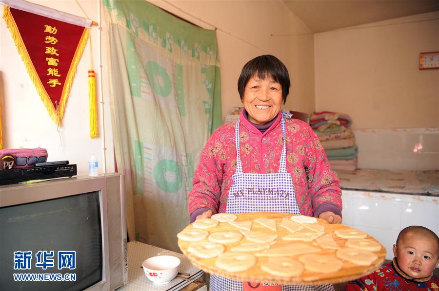 （新华网）（2）陕西延川：油糕的味道