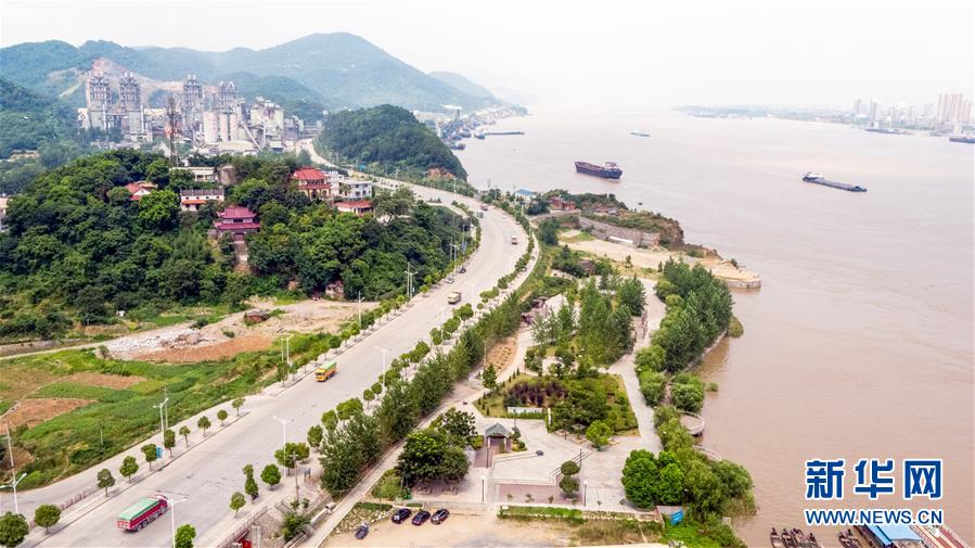 (大江奔流——来自长江经济带的报道·图文互动)(1)为了“一岸翠绿”——江西九江生态修复百里长江