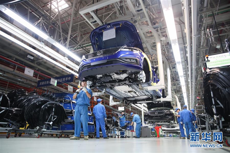 (百城百县百企调研行·图文互动)(3)上海汽车集团走出“中国红”道路