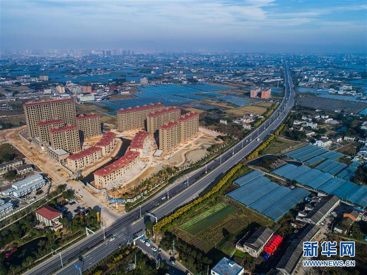 （庆祝改革开放40周年基层行·乡镇篇·图文互动）（2）“中国第一座农民城”温州龙港正向现代化新生城市跨越