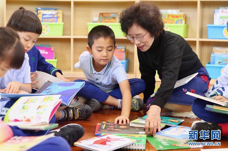 (爱国情 奋斗者·图文互动)(1)封莉容:敬畏教育 以爱传承