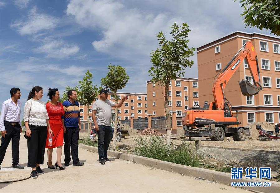 (决战决胜脱贫攻坚·图文互动)(1)抛在旧乡的“火墙”——新疆易地扶贫搬迁安置点见闻