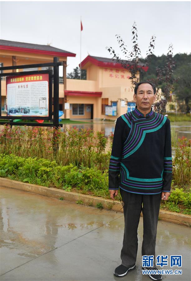 (决战决胜脱贫攻坚·图文互动)(3)“共产党人一直在坚守初心”——一位彝族毕摩后人的感慨