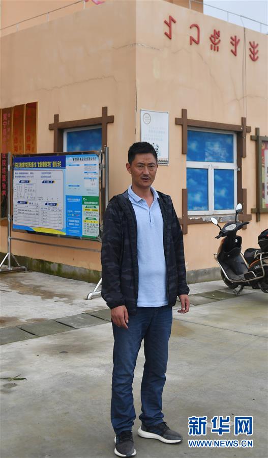 (决战决胜脱贫攻坚·图文互动)(4)“共产党人一直在坚守初心”——一位彝族毕摩后人的感慨