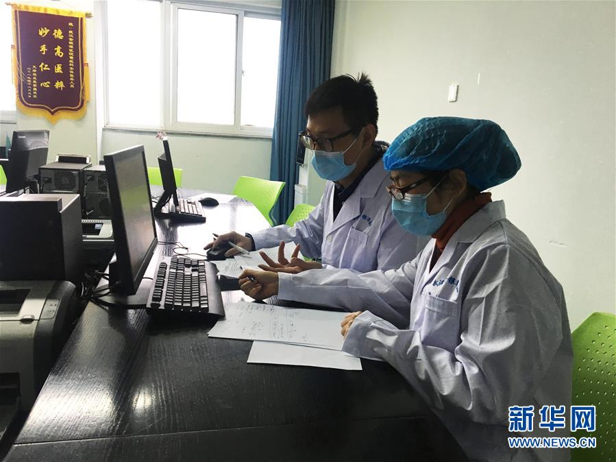 (新型肺炎疫情防控·图文互动)(1)不分昼夜奋战一线 浙江建起“守护者联盟”