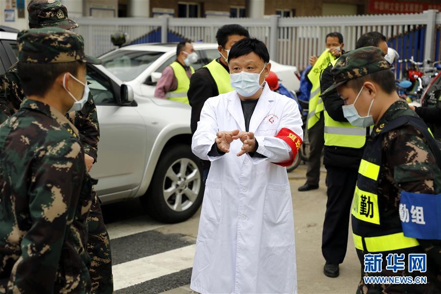 (聚焦疫情防控·图文互动)待到樱花盛开时 再回来吃一碗热干面——一对武汉兄弟的共同战“疫”